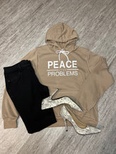 Load image into Gallery viewer, Tan Pullover Peace Over Problems Hoodie Snake Print Heels With Black Jeans
